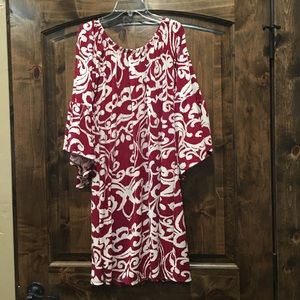 Cute maroon dress with bell sleeves.